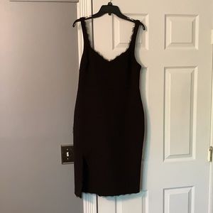 Likely  black strapped midi dress. Size 8. Small slit on the side.
